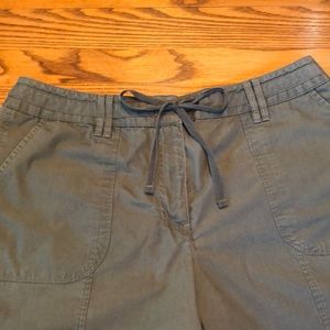 Army green shorts with sewn-in drawstring in front